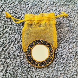 Beautiful sequined and beaded mirror